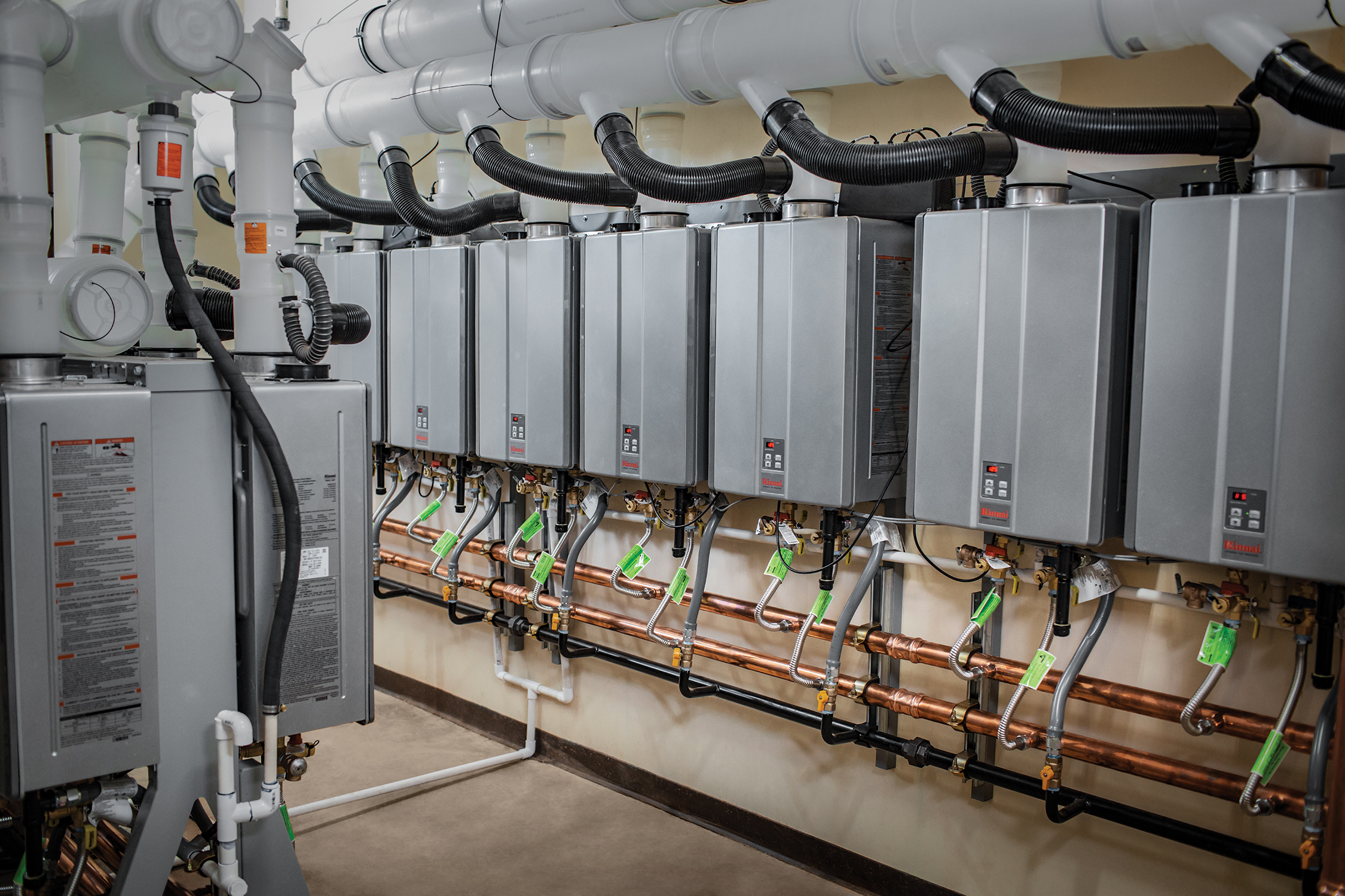 Multiple tankless water heaters installed at a car wash in Oceanside, CA.
